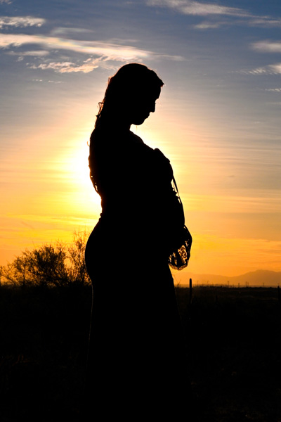 Pregnant woman posing gracefully